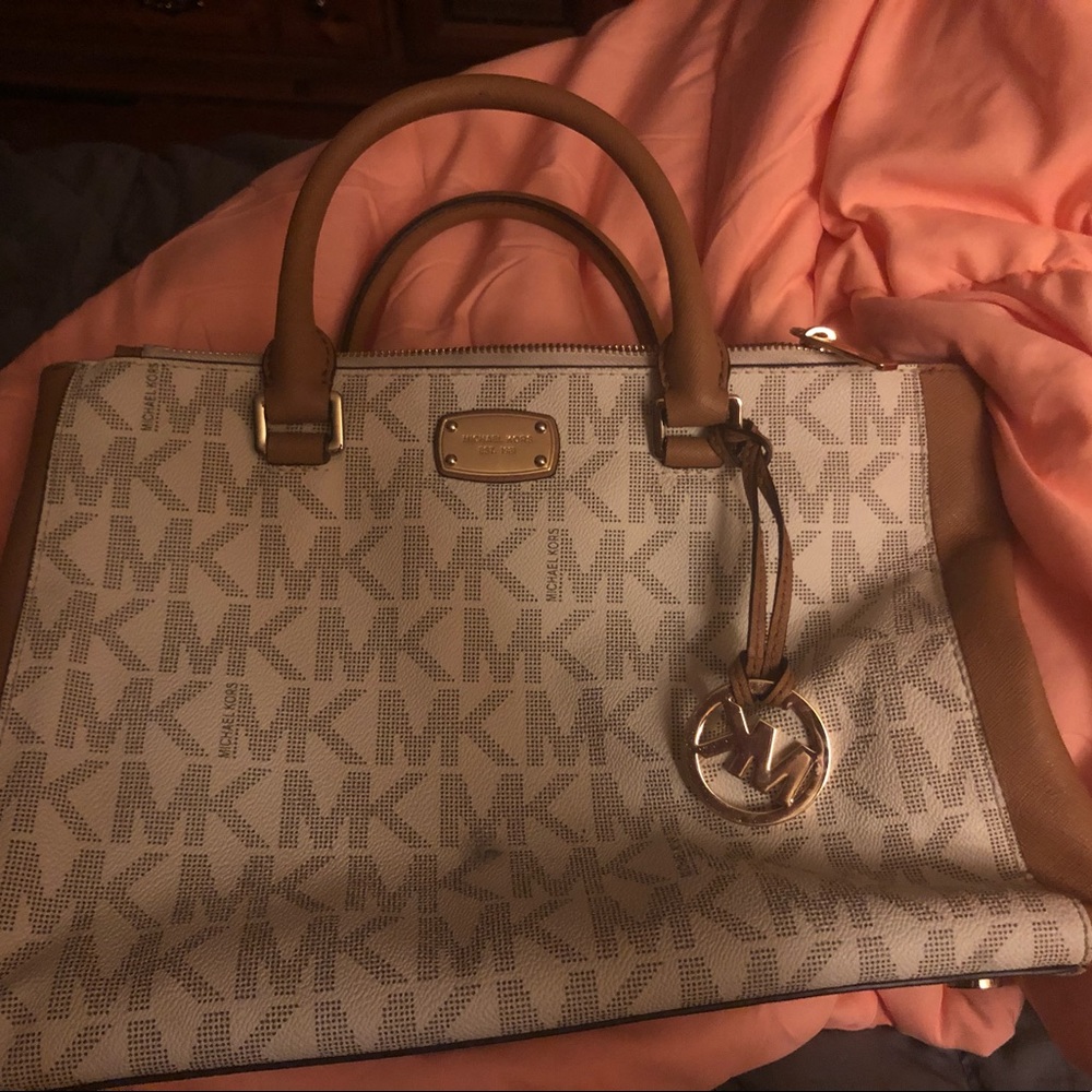 Medium sized cream & brown Michael kors purse